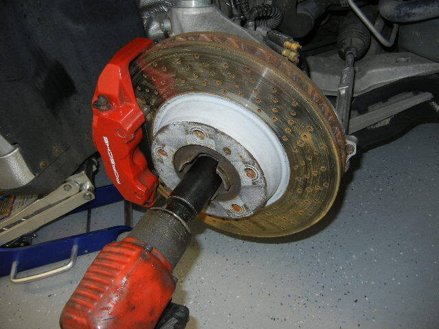 Unbolting the Porsche 996 Turbo axle nut Unbolting the Porsche 996 Turbo axle nut